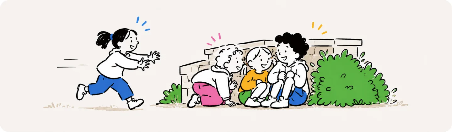 Three kids squeeze together giggling behind a low wall and a bush while the seeker runs in to join them
